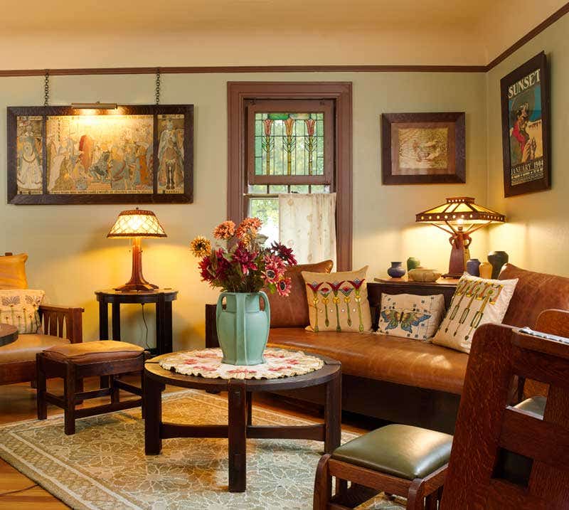 Annalise Key, owner of Southdale Craft, installing premium wallpaper in an Indianapolis home