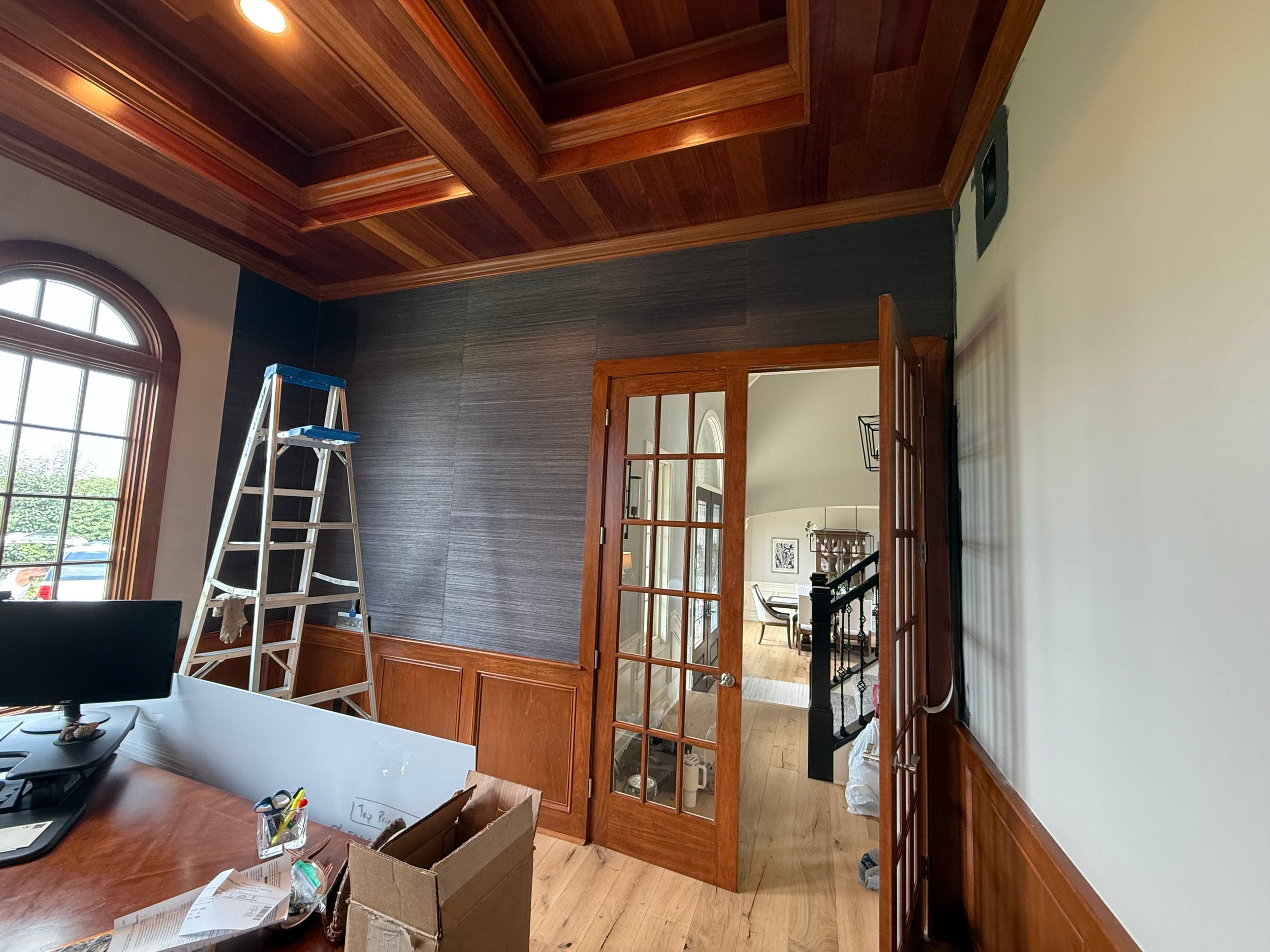 Modern wallpaper installation in a contemporary bedroom design