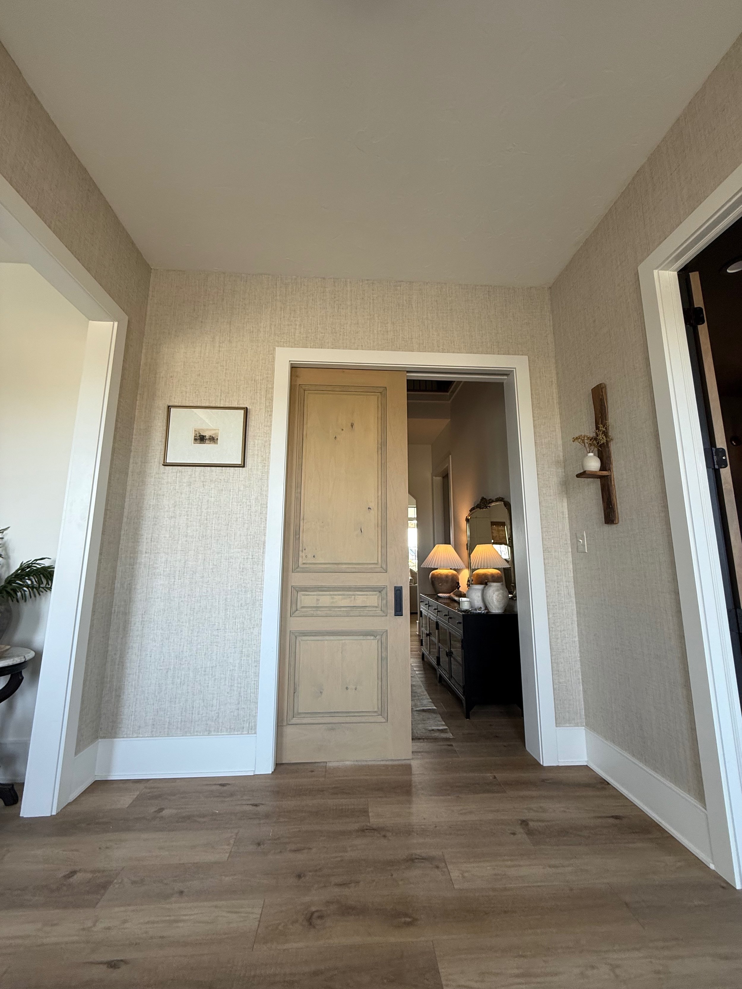 Premium wallpaper feature wall in an artisan-inspired interior